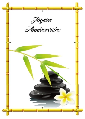 Joyeux anniversaire écrit en élégante calligraphie, entouré de pierres noires, d'une fleur blanche et de bambou stylisé.