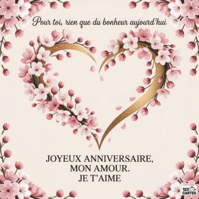 Carte d'anniversaire en forme de cœur, décorée de fleurs roses. Texte : Joyeux anniversaire, mon amour. Je t'aime.