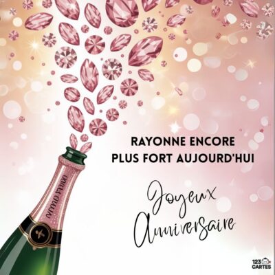 Carte d'anniversaire festive avec bouteille de champagne rosé explosant en diamants roses, texte Rayonne encore plus fort aujourd'hui Joyeux Anniversaire
