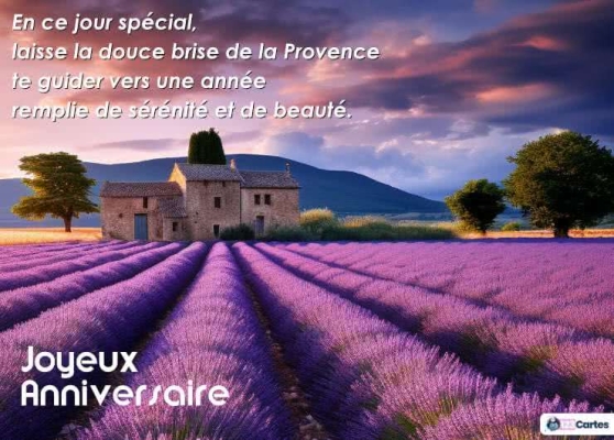 Champ de lavande provençal au coucher du soleil avec maison en pierre, texte Joyeux Anniversaire en blanc. Ciel dramatique.