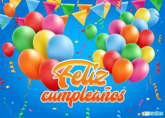 Ballons colorés et guirlandes sur fond bleu avec texte en espagnol Feliz cumpleaños. Ambiance festive et joyeuse pour un anniversaire.