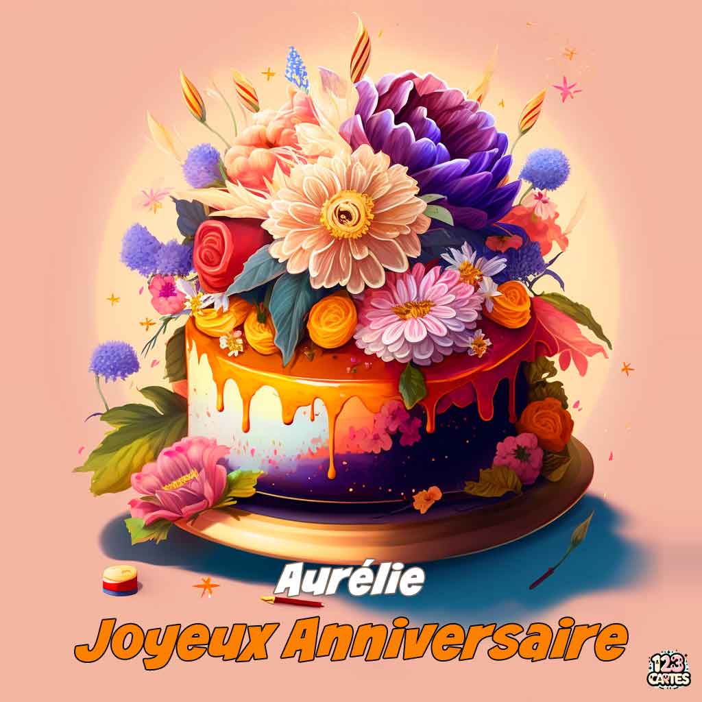 Gâteau décoré de fleurs sur fond orange et texte "Joyeux Anniversaire Aurélie"