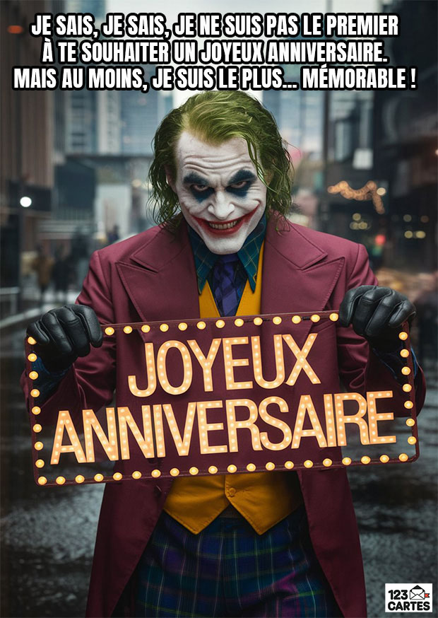 Carte d'anniversaire humoristique avec le personnage Joker tenant une pancarte Joyeux Anniversaire lumineuse.